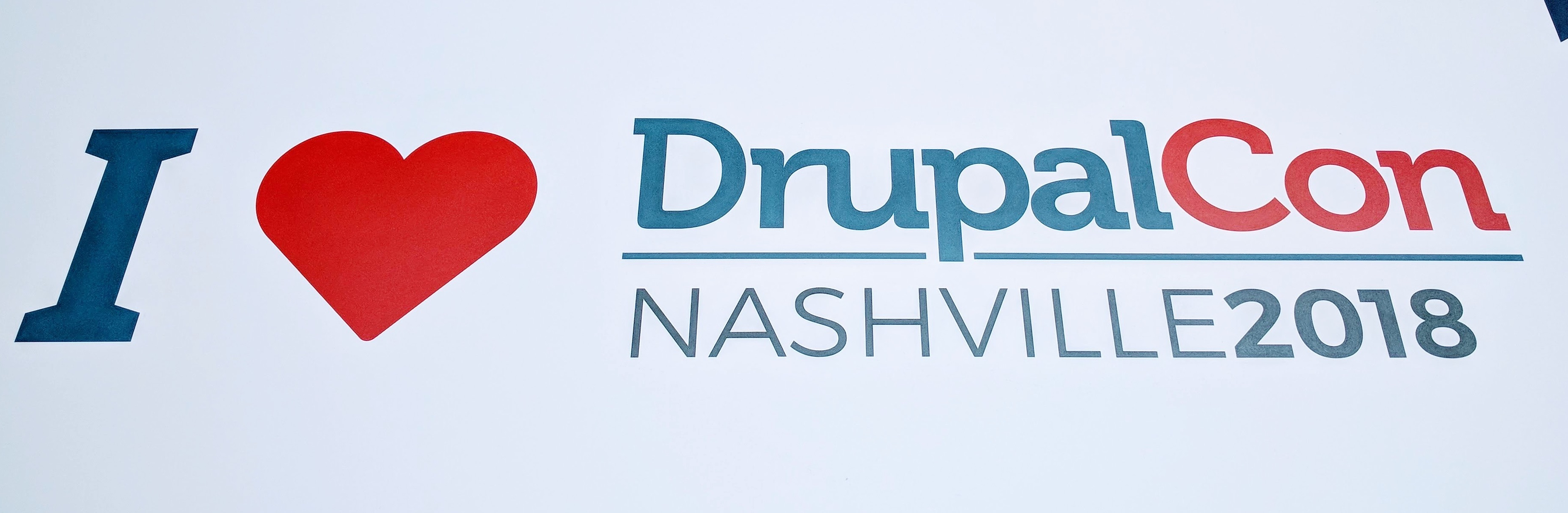 DrupalCon Nashville sign with the words "I Love DrupalCon Nashville 2018"; the word love is replaced with the shape of a heart.